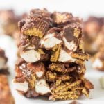 When you bite into one of these no bake s'mores bars you will instantly fall in love. They're made with marshmallows, milk chocolate, heavy cream and golden grahams. Just 4 easy ingredients to pull this summer dessert recipe off!