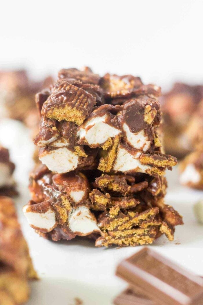 When you bite into one of these no bake s'mores bars you will instantly fall in love. They're made with marshmallows, milk chocolate, heavy cream and golden grahams. Just 4 easy ingredients to pull this summer dessert recipe off!