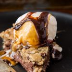The ultimate pie stuffed with a layer of nutella, dulce de leche and gooey chocolate chip cookie dough ohsweetbasil.com