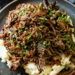 Our readers and are the very best! This recipe is a direct result of a question from a reader. Someone asked if she didn't have ribs, if she could make our Oven Braised Short Ribs with a roast. We started testing and ta da!!! Oven Braised Beef Roast - a juicy, tender, fall apart braised beef roast in a luscious sauce. Who is coming over for dinner?? #roast #beef #braised #meat #dinner #dinnerrecipe #recipe #beefitswhatsfordinner #comfortfood