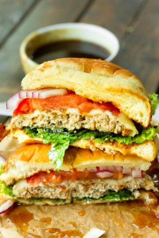 a photo of a pineapple jalapeno turkey burger that has been sliced in half so you can see the inside of the burger