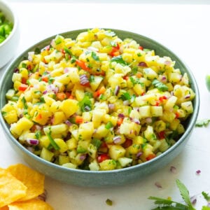 a large bowl of fresh pineapple salsa
