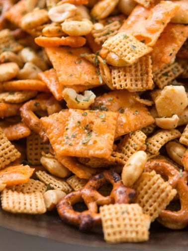 a photo of ranch chex mix with cheezits, pretzels, peanuts and oyster crackers
