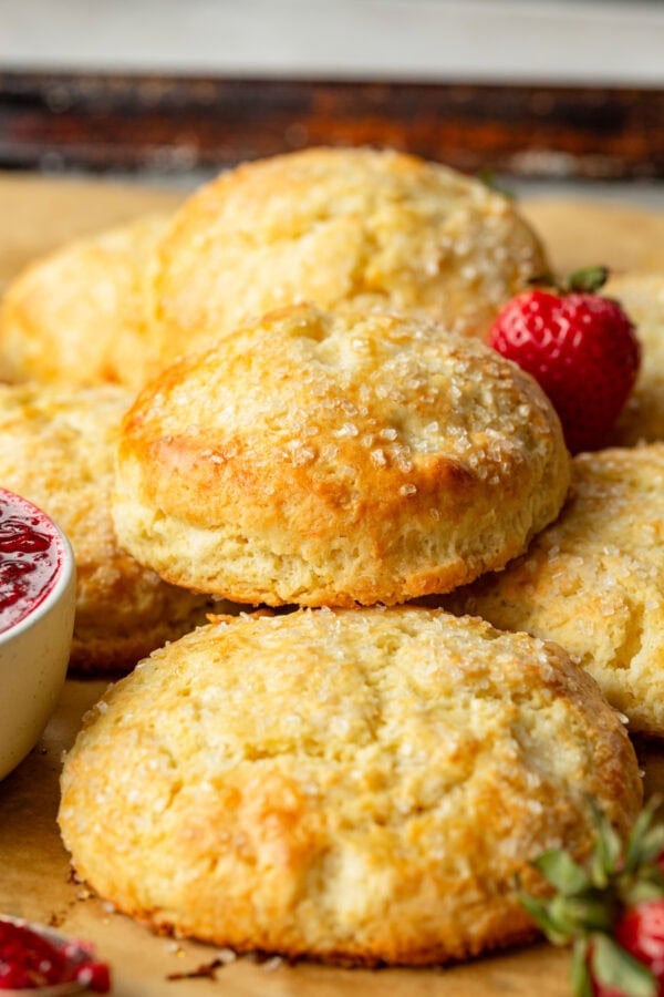 a photo of several golden baked homemade sweet cream biscuits