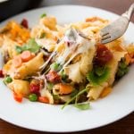 This is one of our favorite dinners, cheesy pan fried tortellini. It's fresh tortellini, sauteed vegetables, and gooey mozzarella cheese, simply delicious! ohsweetbasil.com