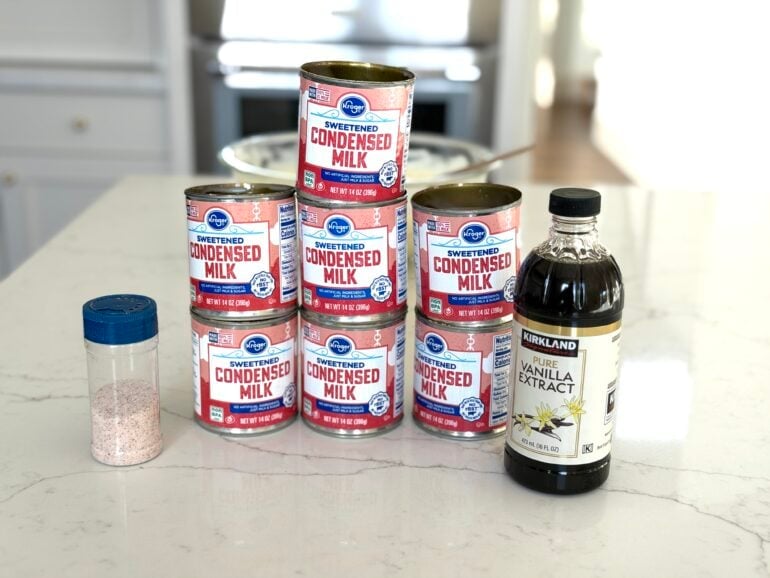 ingredients for how to make caramel with condensed milk including sweetened condensed milk, salt, and vanilla