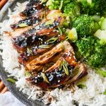 Sticky Asian sauce made with soy sauce and sweet chili sauce served over chicken and rice ohsweetbasil.com
