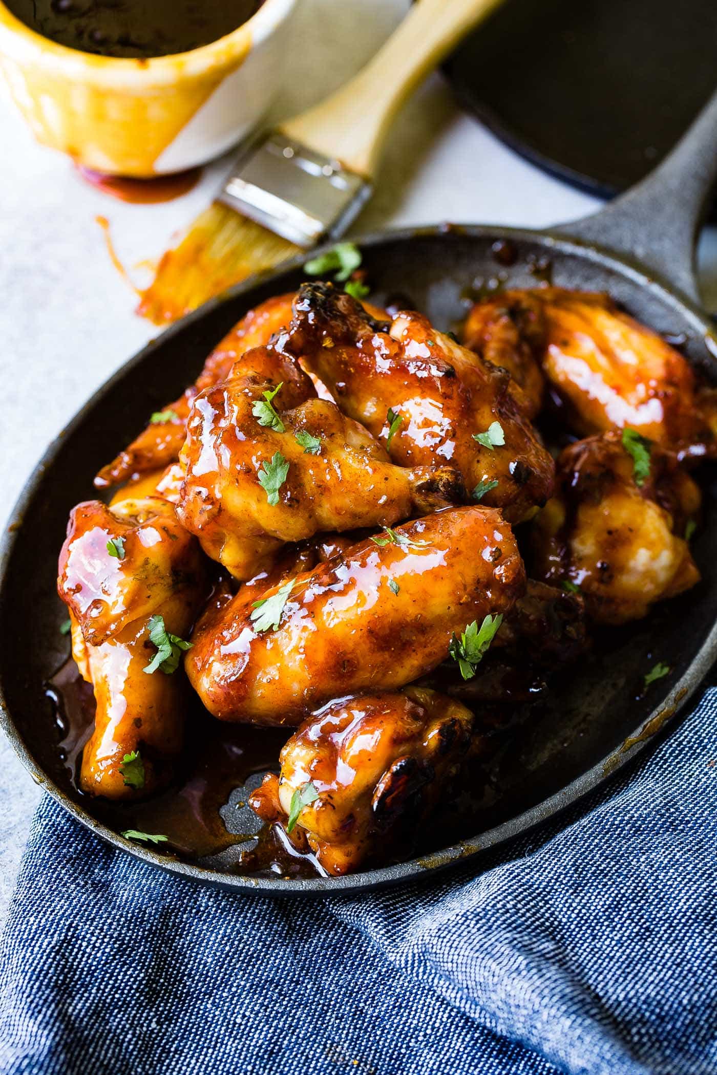 https://ohsweetbasil.com/wp-content/uploads/sticky-glazed-smoked-chicken-wings-on-the-traeger-8.jpg?utm_source=chatgpt.com