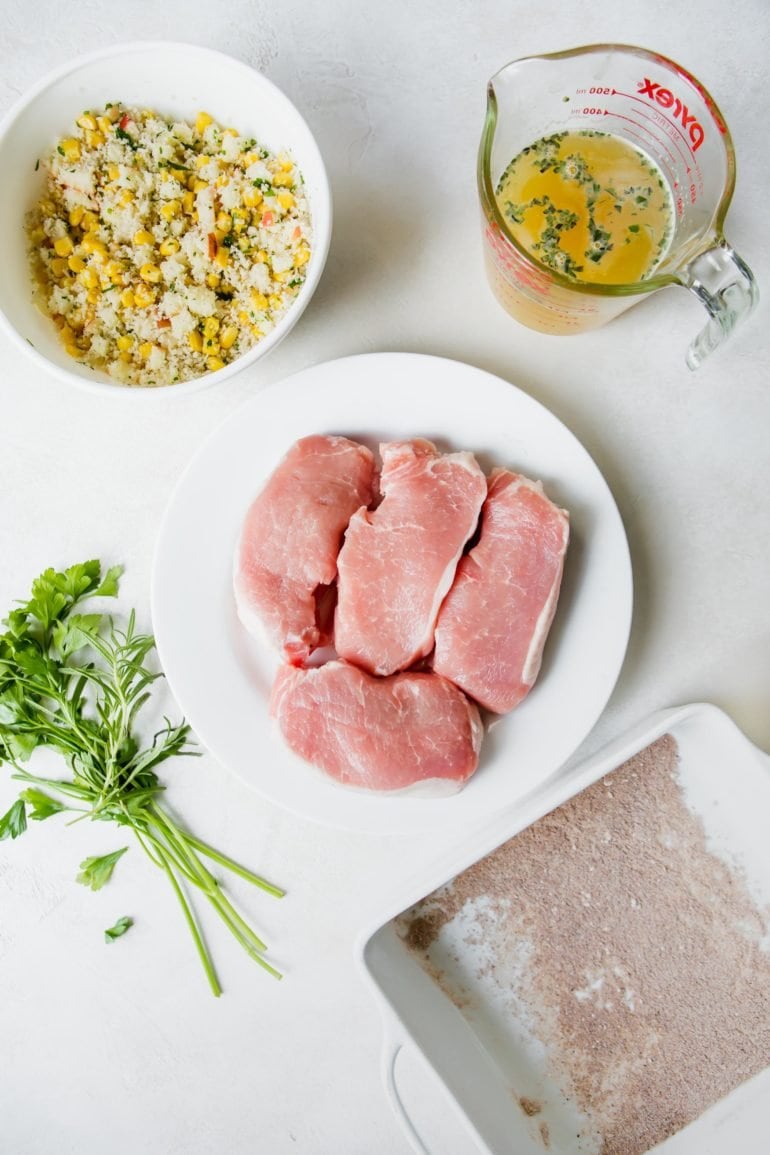a photo of all the ingredients for stuff pork chops sitting on individual plates