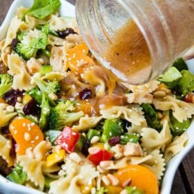 Teriyaki Chicken loaded with veggies, mandarin oranges, pasta and of course a sesame dressing makes up the yummiest teriyaki chicken pasta salad ever! ohsweetbasil.com