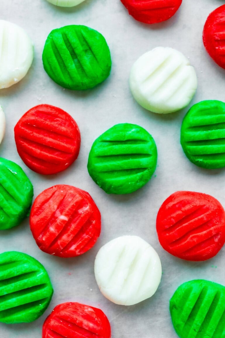 Baking pan with round red, white and green mints pressed with a fork