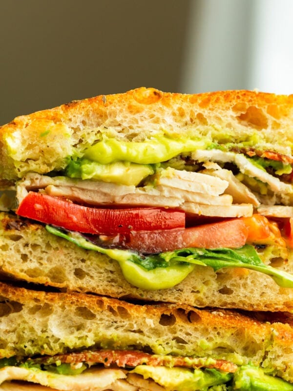 turkey bacon avocado sandwich stacked on each other so you can see the cross section