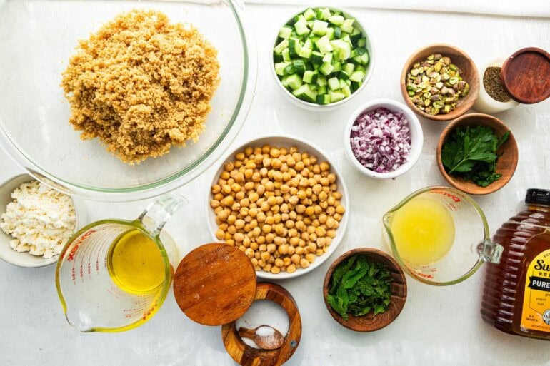 all the ingredients for the jennifer aniston salad in separate small bowls