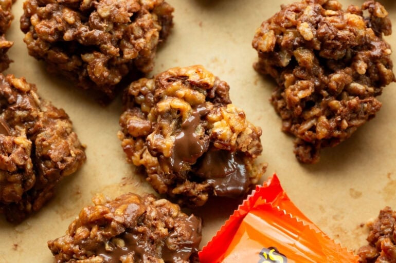 No-bake Reese's Krispies cereal clusters arranged on parchment paper